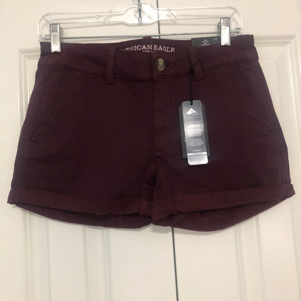 Brand new midi stretchy maroon shorts